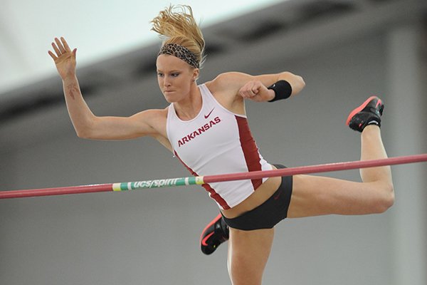 Sandi Morris of Arkansas clears the ball while competing in the pole vault during the Tyson Invitational Saturday, Feb. 14, 2015, at the Randal Tyson Track Center in Fayetteville.