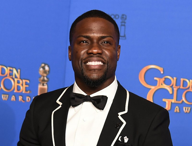 In this Jan. 11, 2015, file photo, presenter Kevin Hart poses in the press room at the 72nd annual Golden Globe Awards at the Beverly Hilton Hotel in Beverly Hills, Calif. 