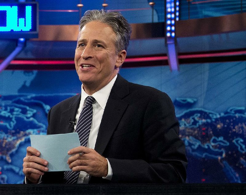 FILE - In this Oct. 18, 2012 file photo, Jon Stewart speaks during a taping of "The Daily Show with John Stewart", in New York. The U.S. Embassy in Cairo has at least temporarily shut down its Twitter feed following an unusual diplomatic incident involving "The Daily Show" host Jon Stewart and the Egyptian government. (AP Photo/Carolyn Kaster, file)