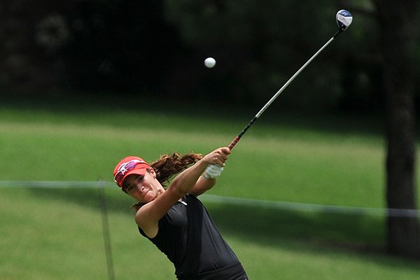 University of Arkansas golfer Gaby Lopez takes a shot on the fairway of hole No. 14 during the Walmart NW Arkansas Championship on Sunday, June, 29, 2014 at Pinnacle Country Club in Rogers. 