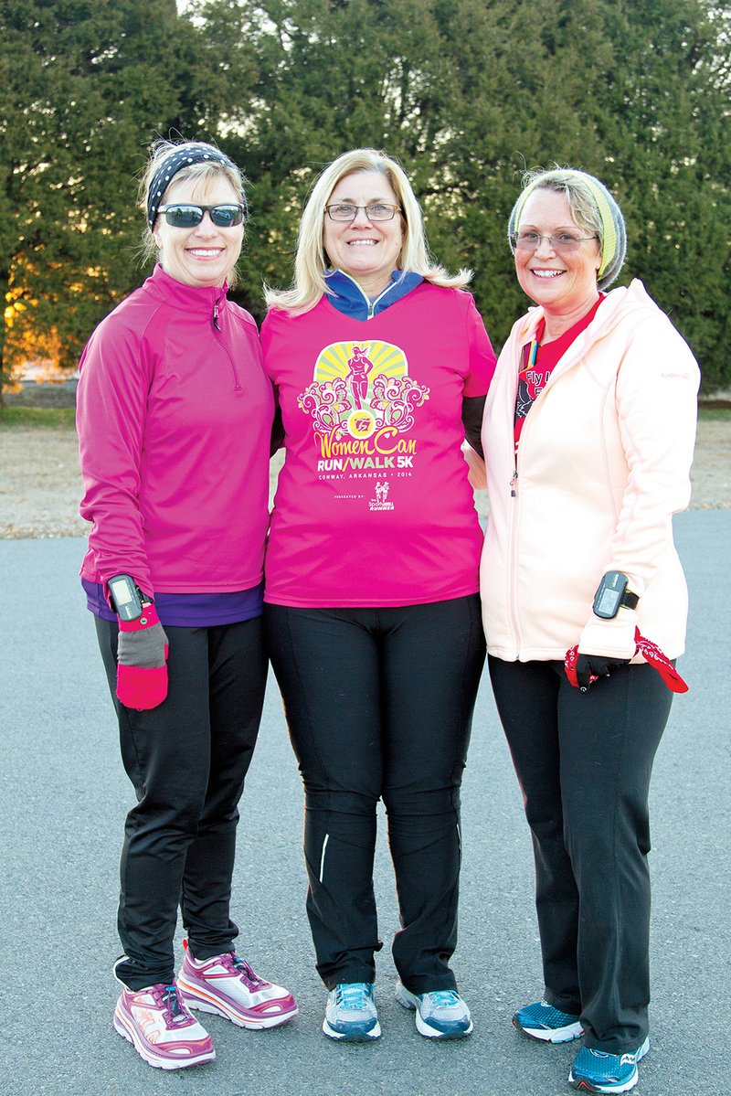 From left, Jane Gunter, Vicky Reeves and Sara Patterson get ready for a run in Cabot on Saturday morning. Reeves and Patterson are co-coordinating the Women Can Run/Walk clinic in Cabot this year.
