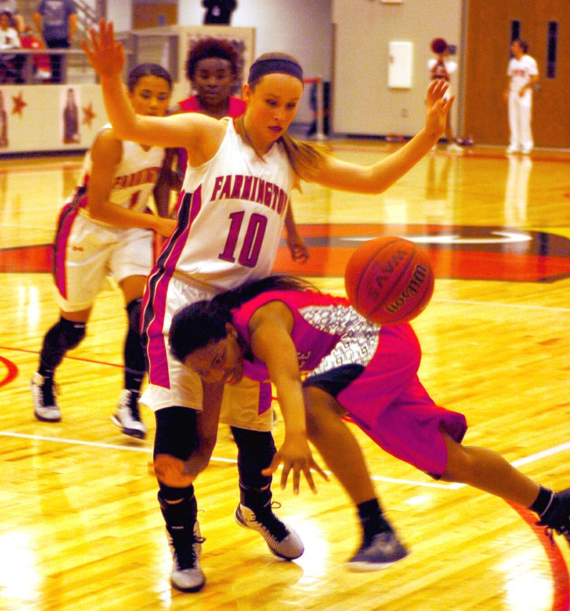 MARK HUMPHREY ENTERPRISE-LEADER Trish O&#8217;Connell&#8217;s tight defense in Farmington&#8217;s man-to-man causes a Maumelle turnover. The Lady Cardinals defeated the Hornets, 71-32, on Feb. 6.