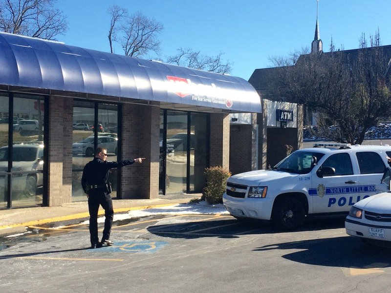 North Little Rock police investigate a Wednesday afternoon armed robbery at the U.S. Bank at 4140 John F. Kennedy Blvd. 