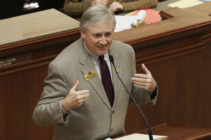 Rep. Mark Lowery, R-Maumelle, closes for his bill dealing with creation of new school districts in the House chamber at the Arkansas state Capitol in Little Rock, Ark., Tuesday, Feb. 17, 2015. 