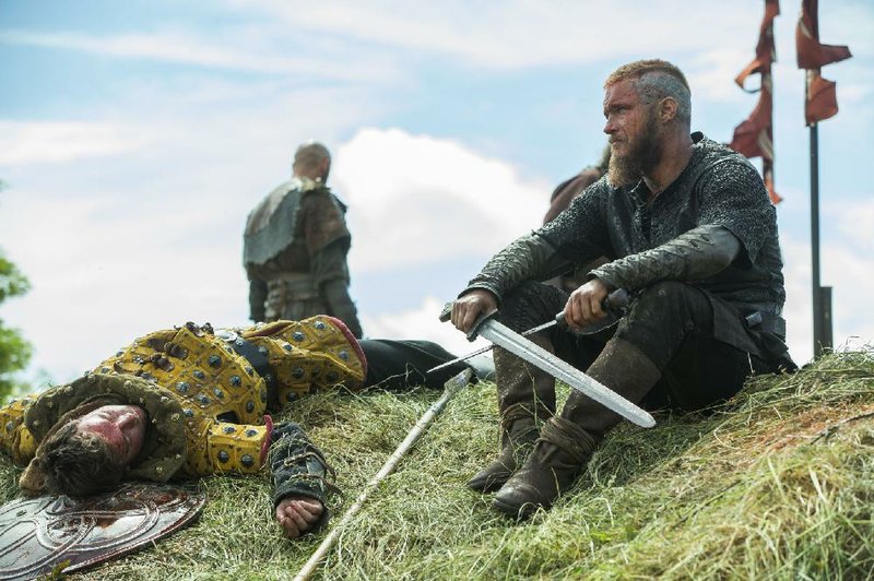 Ragnar Lothbrok (Travis Fimmel) surveys the aftermath of battle in Season 3 of History Channel’s Vikings.