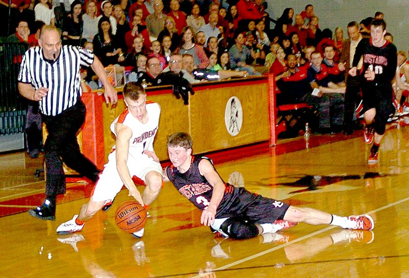 RICK PECK MCDONALD COUNTY PRESS McDonald County&#8217;s Drew Harmon goes for a steal as Providence Academy&#8217;s Garrett Greenway dribbles down court during the Mustangs 51-48 loss Feb. 12 at MCHS.