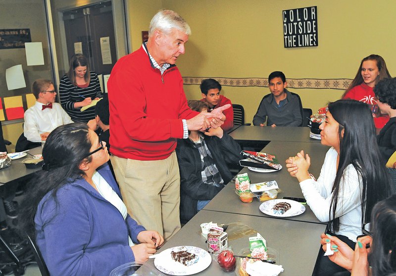 NWA Democrat-Gazette/Michael Woods &#8226; @NWAMICHAELW School of Innovation eighth-graders Yulissa Rivera (right) and Valeria Peltras (left) chat with 3rd District U.S. Rep. Steve Womack after he spoke Wednesday afternoon during their lunch break at the Jones Center in Springdale. Womack encouraged the students to be excited about their educational opportunities and answered questions from the students. For photo galleries, go to nwadg.com/photos.