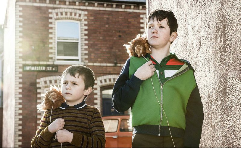 Jamesy (Riley Hamilton) and Malachy (Aaron Lynch) make pets of baby chicks that their father brings home in Boogaloo and Graham, an Oscar- nominated short film set in Belfast, Northern Ireland, in 1978.