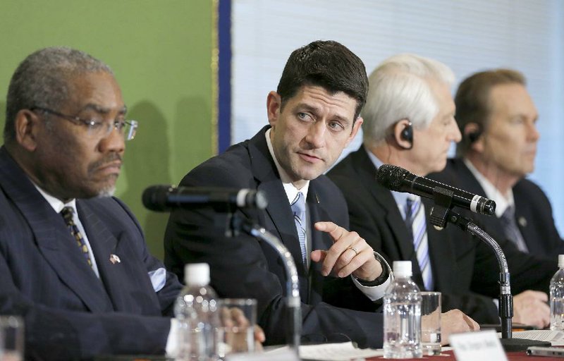 U.S. Rep. Paul Ryan, R-Wis. (second from left), speaking Thursday in Tokyo, said he expects Congress to grant President Barack Obama trade promotion authority this spring. 