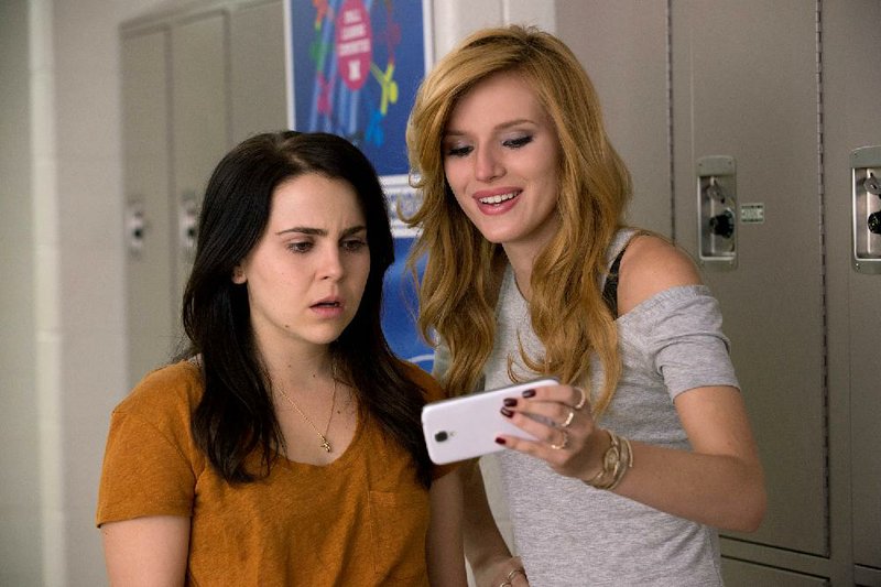 Bianca (Mae Whitman) is dismayed when mean girl Madison (Bella Thorne) points out some harsh truths in The DUFF.