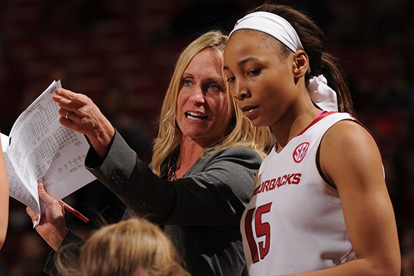 Arkansas assistant coach Christy Smith speaks with Kelsey Brooks (15) against Missouri during the second half Saturday, Jan. 17, 2015, in Bud Walton Arena in Fayetteville.