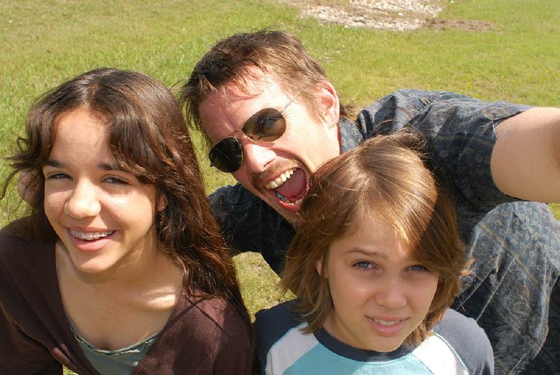 Lorelei Linklater, Ethan Hawke and Ellar Coltrane star in Boyhood.