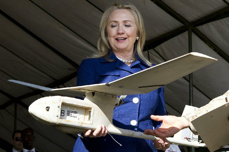 Hillary Clinton, former Arkansas first lady, displays the patrol drone recently bought by the Clinton Presidential Center. Cammack Village now has the upgraded version.