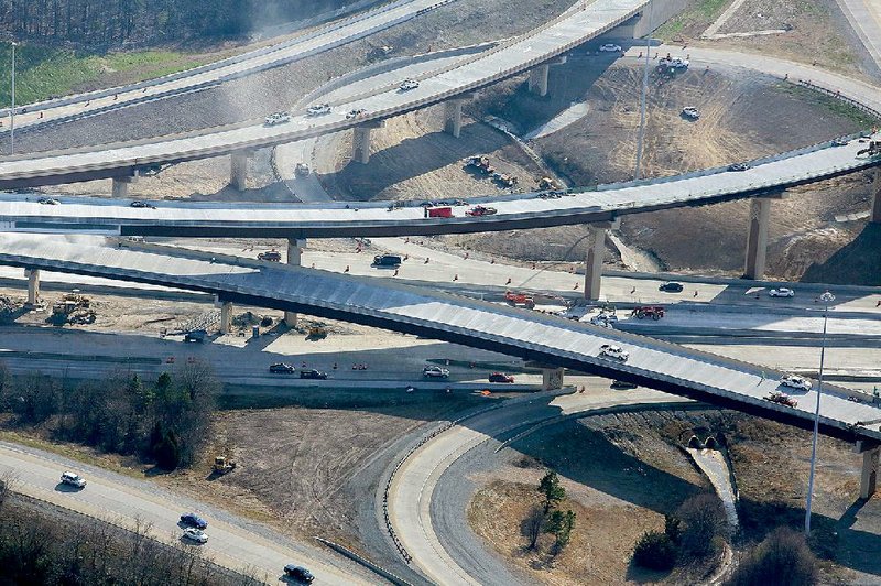 Construction continues in January on the Big Rock interchange, where Interstates 430 and 630 meet in Little Rock. It is one of several projects underway in Arkansas as the state deals with declining federal dollars for highway work. 