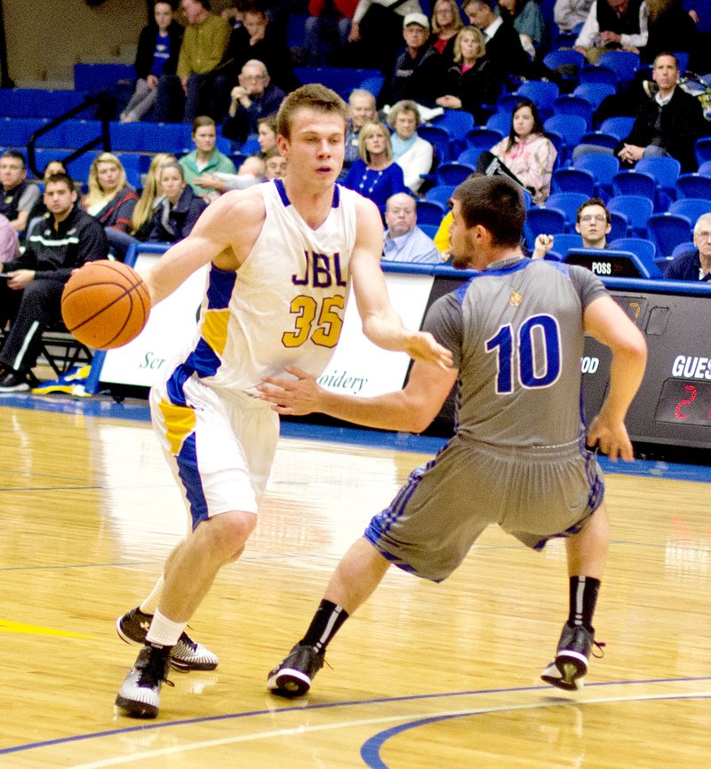 Nathan Marquardt/JBU Sports Information John Brown senior Max Hopfgartner scored 25 points and pulled down 12 rebounds in the Golden Eagles&#8217; 82-71 loss to Wayland Baptist on Thursday at Bill George Arena.