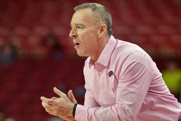 Jimmy Dykes coaches Arkansas during the game against LSU at Bud Walton Arena in Fayetteville on Sunday, Feb. 22, 2015.