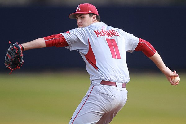 Arkansas pitcher Keaton McKinney throws a pitch during a game against Maryland on Sunday, Feb. 22, 2015, at Stanky Field in Mobile, Ala. 