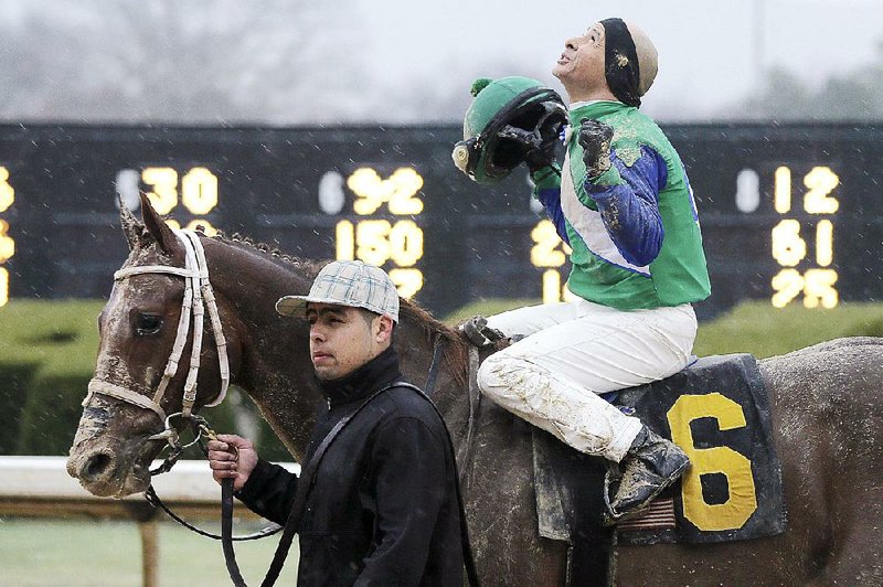 Jockey Mike Smith (center) and Far Right, who came from behind to win the Smarty Jones Stakes in January, charged down the stretch to pull ahead of pre-race favorite Mr. Z to win the $300,000 Southwest Stakes on Sunday at Oaklawn Park in Hot Springs. 