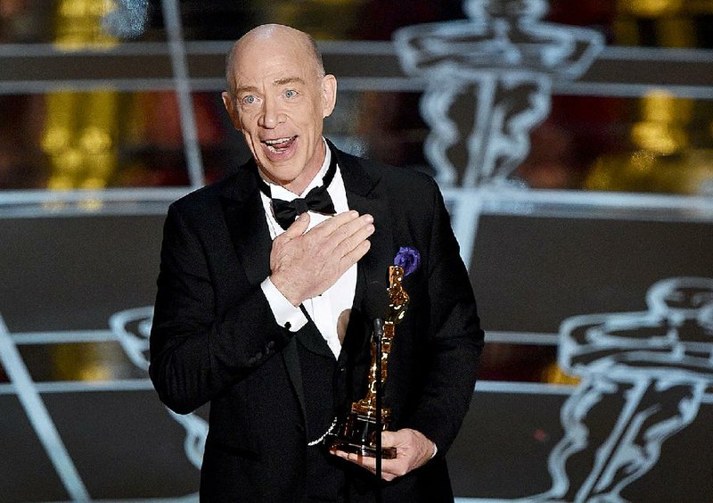 J.K. Simmons accepts the award Sunday for best actor in a supporting role for Whiplash at the 87th annual Academy Awards at the Dolby Theatre in Los Angeles. 