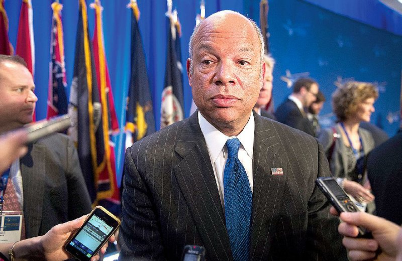 Department of Homeland Security Secretary Jeh Johnson speaks with reporters at the conclusion of the Homeland Security and Public Safety Committee's session on cybersecurity during the  National Governors Association Winter Meeting in Washington, Sunday, Feb. 22, 2015. 