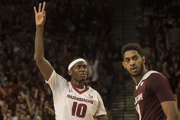 Arkansas sophomore Bobby Portis celebrates a made 3-pointer against Texas A&M in the first half Tuesday, Feb. 24, 2015, at Bud Walton Arena in Fayetteville.