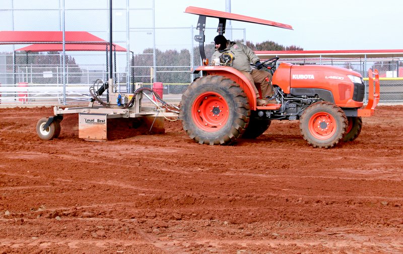 LYNN KUTTER ENTERPRISE-LEADER James Goins with River City Athletic Fields of Soddy-Daisy, Tenn., worked on an infield at Farmington Sports Complex last fall. The city replaced all infields because of a continuous problem with rocks and pea gravel in the dirt. The sports complex is gearing up for its fourth season.
