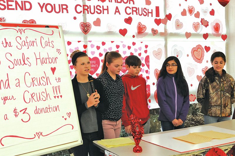 Lingle students Josie Stitt (from left), Kelsey Byrd, Reid Renfrow, Arianna Arriola and Abigail Pappas tell classmates Tuesday how the fundraising project got started.