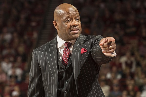 Arkansas head coach Mike Anderson calls to the bench against Texas A&M in the second half Tuesday, Feb. 24, 2015, at Bud Walton Arena in Fayetteville.