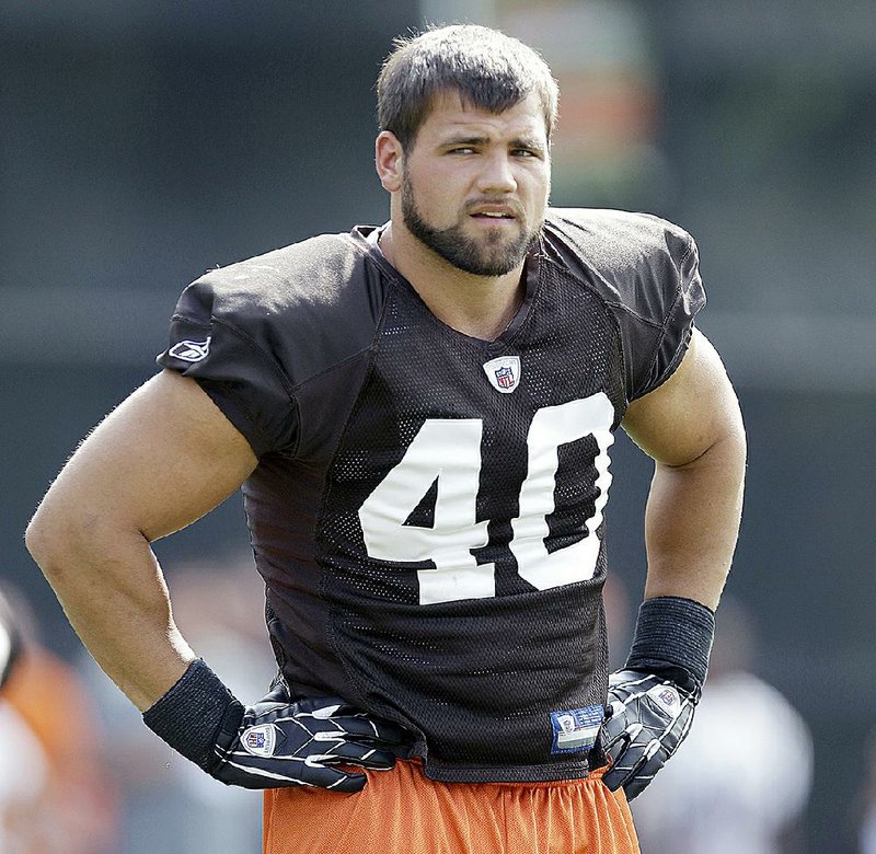 In this file photo taken Aug. 4, 2011, Cleveland Browns running back Peyton Hillis during practice at the NFL football team's training camp in Berea, Ohio. The New York Giants have released running back Peyton Hillis (Conway, Arkansas Razorbacks).