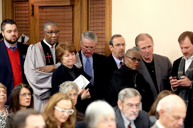 Baptist minister and Pulaski County Circuit Judge Wendell Griffen (second from left) wore vestments to Wednesday’s hearing of the Senate Judiciary Committee. The committee voted in favor of legislation to abolish the death penalty in Arkansas.