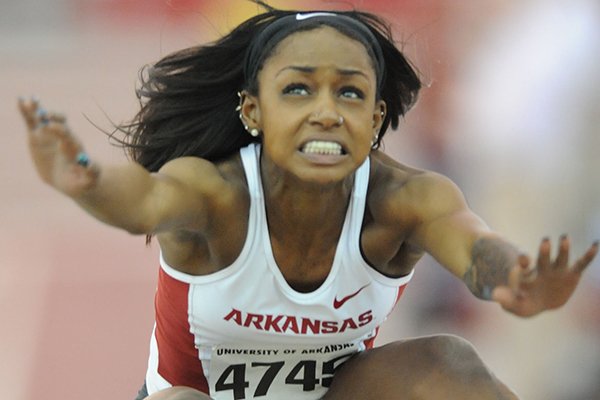 Aatiyah Henry of Arkansas competes in the long jump during the Arkansas Open Saturday, Feb. 21, 2015, at the Randal Tyson Track Center in Fayetteville.