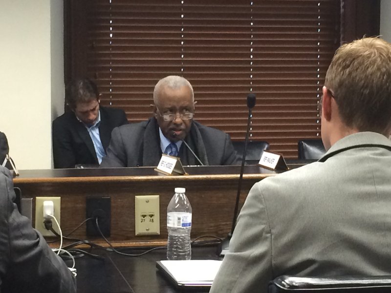 Rep. John Walker, D-Little Rock, asks Rep. Bruce Cozart, R-Hot Springs, questions about House Bill 1263, which would allow schools that fall below an enrollment of 350 avoid consolidation if the district is meeting academic, financial and facility standards set by the state.