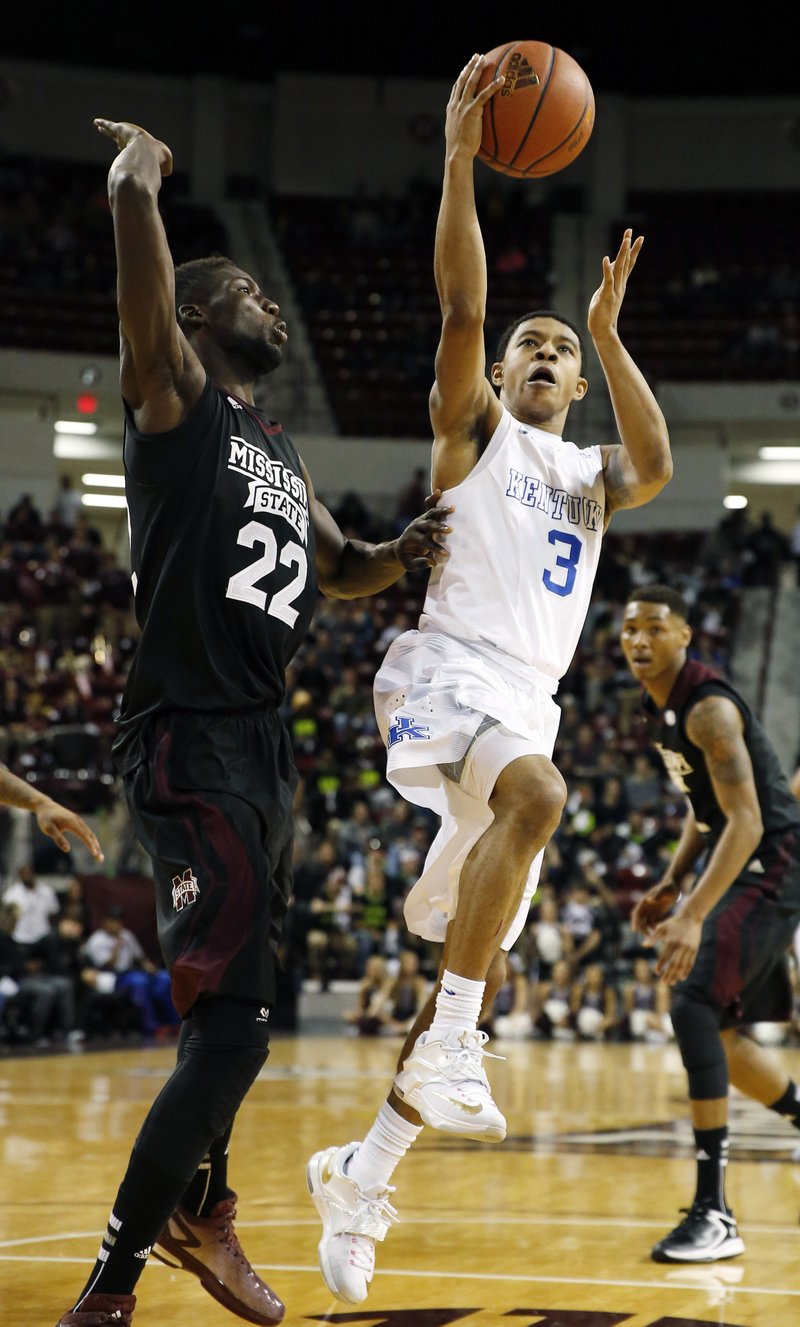 Tyler Ulis (3), Kentucky guard, drives against Mississippi State forward Fallou Ndoye (22) in the second half of Wednesday game in Starkville, Miss. 