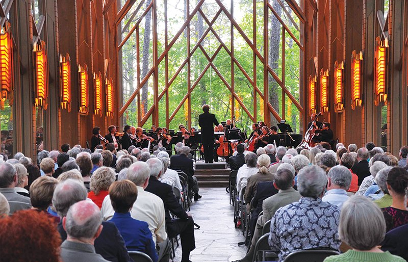 Submitted photo SERENE SETTING: Members of the Arkansas Symphony Orchestra are shown during a previous performance in Anthony Chapel at Garvan Woodland Gardens. Tickets are now on sale for this year&#8217;s concert, which will be at 3 p.m. March 22 in the chapel.