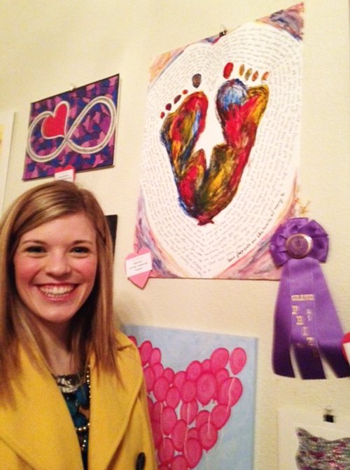 Submitted photo: BEAMING ARTIST: The grand prize for 2014's Have a HeART for Art competition went to Lakeside High School's Bailey Dwyer, shown with her award-winning creation. The seventh annual public exhibition will be at 5:30 p.m. March 6 in Emergent Arts, 341 Whittington Ave.