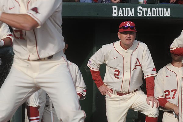 Arkansas coach Dave Van Horn watches from the dugout during a game against North Dakota on Friday, Feb. 13, 2015, at Baum Stadium in Fayetteville. 