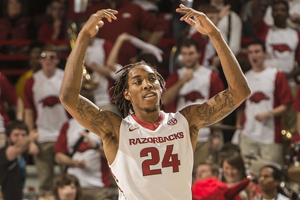 Arkansas junior Michael Qualls gets pumped up against Texas A&M in the first half Tuesday, Feb. 24, 2015 at Bud Walton Arena in Fayetteville. 