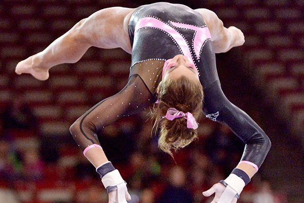 Arkansas freshman Paige Zaziski competes on the bars during a meet against Missouri on Friday, Feb. 27, 2015, at Barnhill Arena in Fayetteville. 