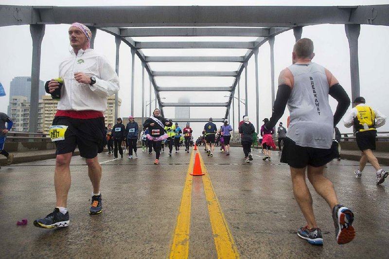 Runners will have a new course to navigate this year during the Little Rock Marathon. Participants will not have to cross the Broadway Bridge because of construction related to the eventual demolition of the bridge, which required the course to be rerouted to include 4 additional miles in downtown Little Rock. 