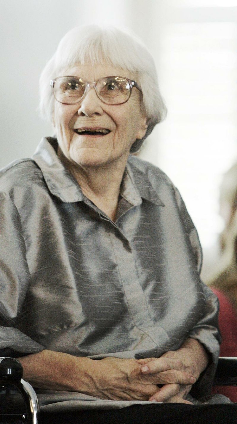 File-This Aug. 20,2007 file photo shows author Harper Lee smiling during a ceremony honoring the four new members of the  Alabama Academy of Honor in at the Capitol in Montgomery, Ala. "To Kill a Mockingbird" author Lee has settled a New York lawsuit against two of the defendants she sued in May to re-secure the copyright to her Pulitzer Prize-winning novel. A court filing Friday Sept. 6, 2013, in federal court in Manhattan says Lee's lawsuit against defendants Leigh Ann Winick and Gerald Posner has been dismissed. A lawyer for the two said a settlement with the remaining defendants is likely to be reached next week. (AP Photo/Rob Carr, File)
