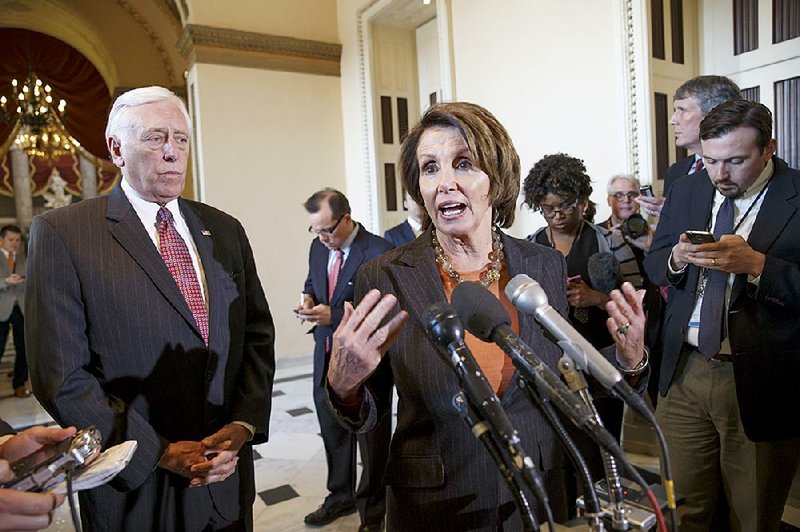 House Minority Leader Nancy Pelosi, accompanied by the No. 2 House Democrat, Steny Hoyer, voices her objections to the Republican majority during a delay in voting for a short-term spending bill for the Homeland Security Department.