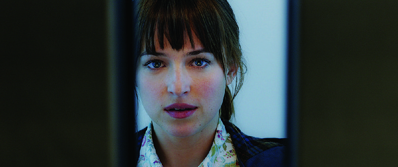 College senior Anastasia Steele (Dakota Johnson, above) embarks on a relationship with a billionaire businessman in an erotic fantasy that is Fifty Shades of Grey.