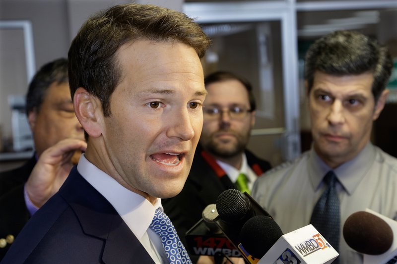 In this Feb. 6, 2015 file photo, Rep. Aaron Schock, R-Ill. speaks to reporters in Peoria Ill. Schock personally reimbursed $40,000 in congressional office renovations after a news report revealed the lavish-looking decorations, The Associated Press has learned. 