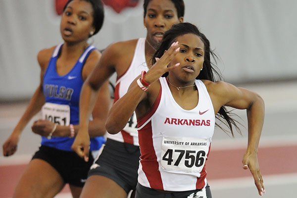 Chrishuna Williams of Arkansas leads the field in the 400 meters during the Arkansas Open Saturday, Feb. 21, 2015, at the Randal Tyson Track Center in Fayetteville.
