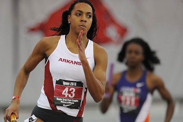 Taylor Ellis Watson of Arkansas leads the field while competing in the 4x400-meter relay during the Tyson Invitational Saturday, Feb. 14, 2015, at the Randal Tyson Track Center in Fayetteville.
