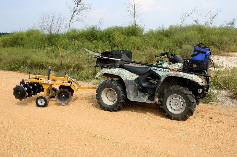 Arkansas Democrat-Gazette/BRYAN HENDRICKS
A King Kutter ATV Compact Disc is ideal for cultivating food plots in secluded woodland openings. 
