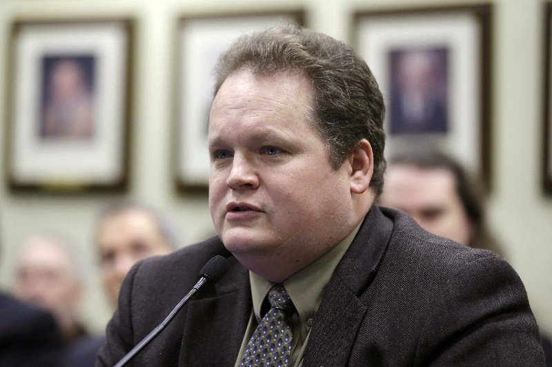 Rep. Nate Bell, R-Mena, presents his bill dealing with rights of public employees during a meeting of the House Committee on State Agencies and Governmental Affairs at the Arkansas state Capitol in Little Rock, Ark., Wednesday, Feb. 4, 2015. The bill advanced through the committee. (AP Photo/Danny Johnston)