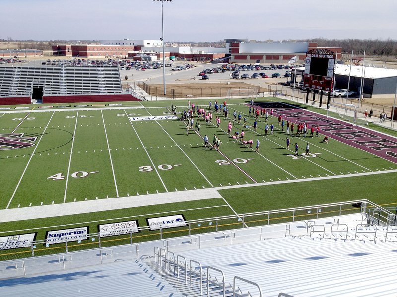 Graham Thomas/Siloam Sunday The Siloam Springs football team worked out under sunny skies Wednesday afternoon inside Panther Stadium. The stadium officially opens on Tuesday with a nonconference soccer doubleheader against Harrison. The night starts with a junior varsity boys game at 4 p.m., followed by varsity boys at 5 p.m. and varsity girls at 6 p.m.