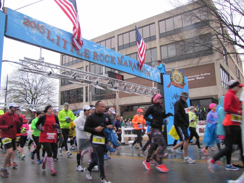 Runners cross the starting line of the 2015 Little Rock Marathon.