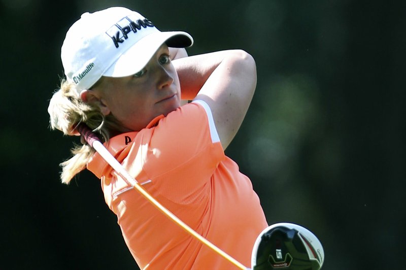 Stacy Lewis of The Woodlands, Texas watches her ball fly from the second tee during the third round of the LPGA Coates Golf Championship at the Golden Ocala Golf and Equestrian Club in Ocala, Fla. on Friday, Jan. 30, 2015. (AP Photo/The Ocala Star-Banner, Bruce Ackerman)